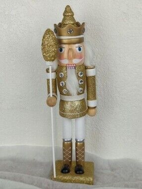 One 14" Tall Solid Wood Nutcracker King In Glittering Gold. (multiple available)